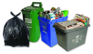 Trash bag and the various recycling containers available in Niagara.